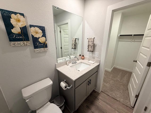 attached private, full bathroom with the ensuite bedroom or 2nd primary bedroom with a bathroom inside the room and a walk-in closet