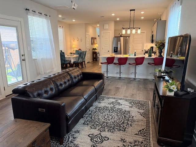 Shared space in the living room, kitchen, and dining