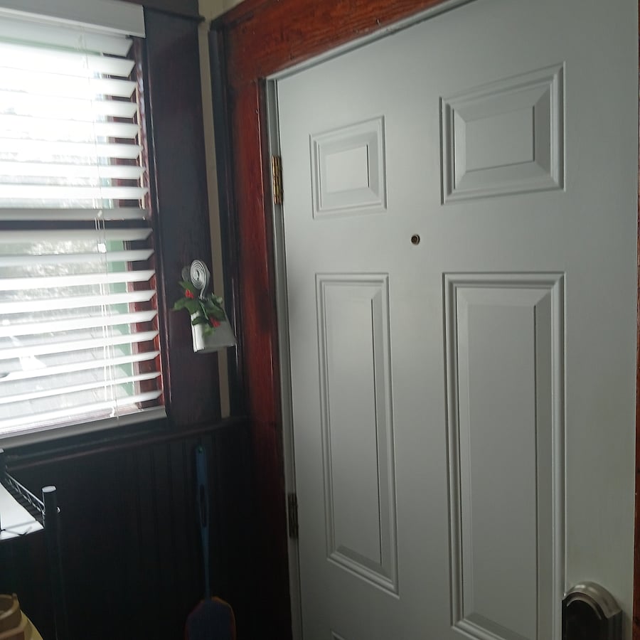 Kitchen door leading to backyard stairs landing. Notice the ORIGINAL milkman-delivery bell by the door. It works! Just pull on the outside wire-cable to ring it.