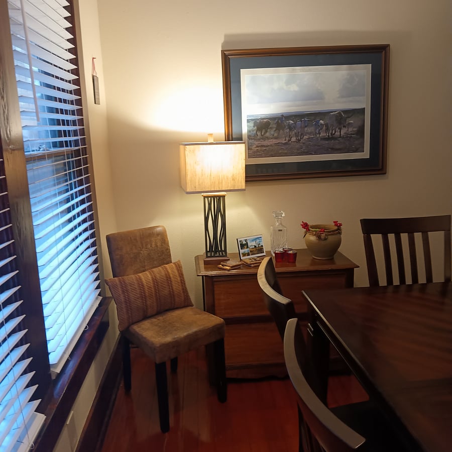 A bit of Texas southwest. This room has a ceiling fan with remote control and recessed dimmable lighting.