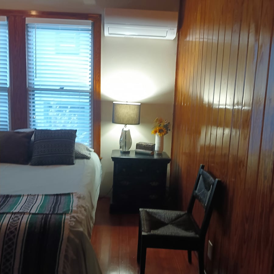 Each nightstand has a lamp for reading in bed.