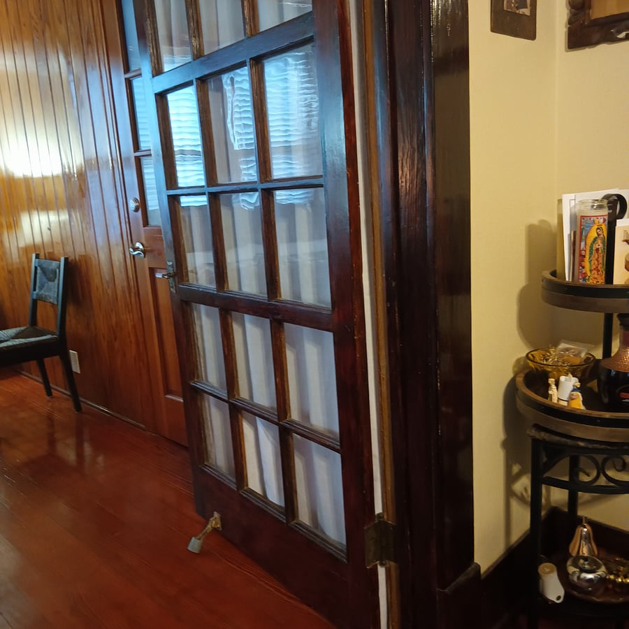 Opened door into the master bedroom.