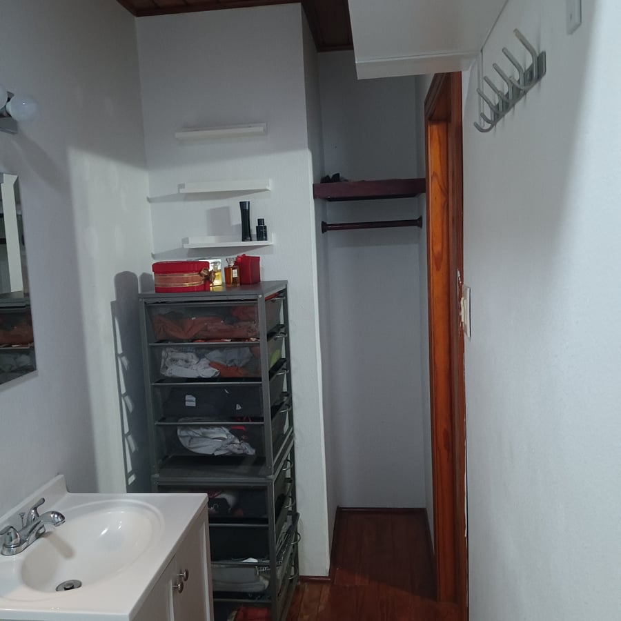 Clothes hanging space.