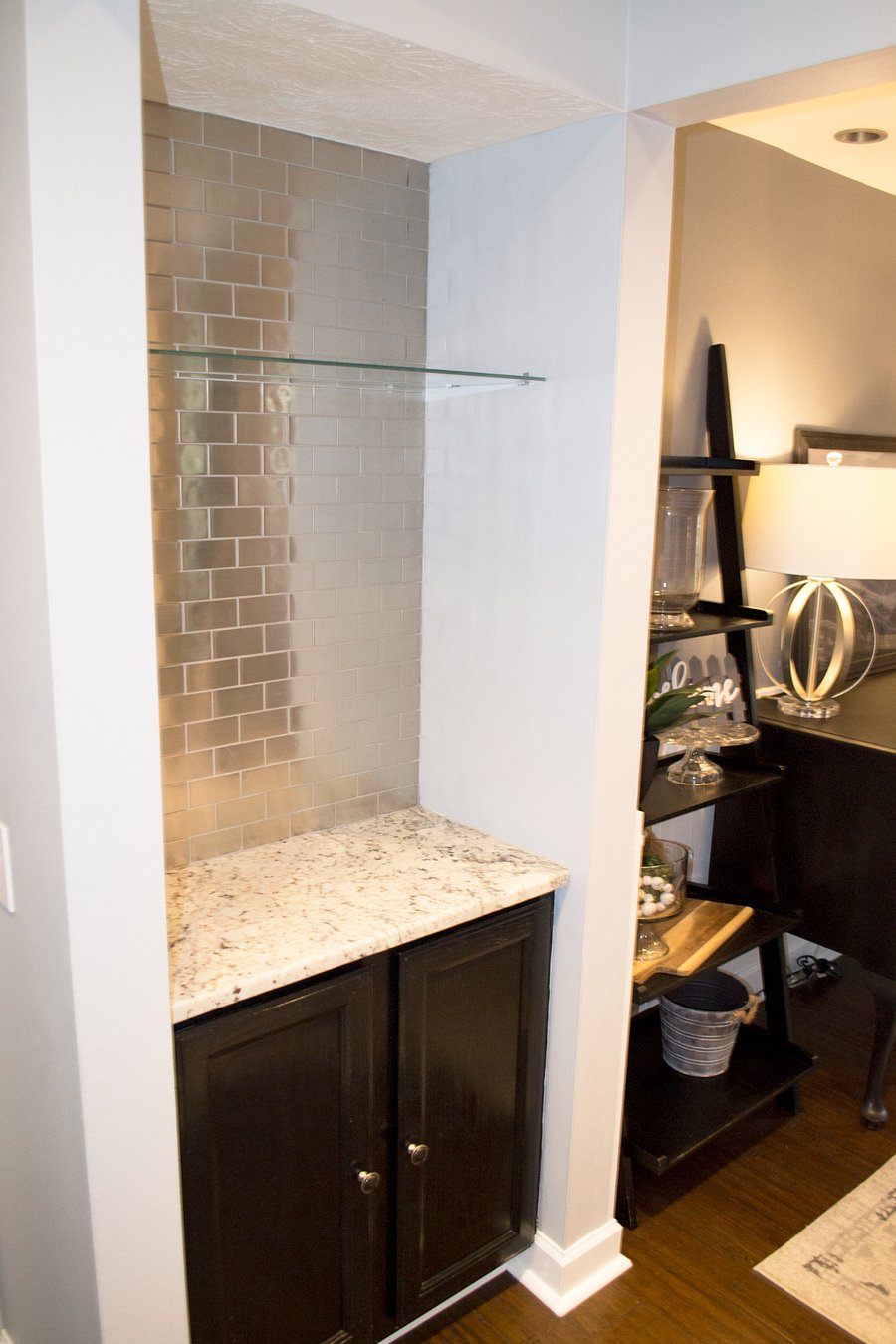 Space adjacent to the dining room and kitchen for storage and a place to put dishes while eating.