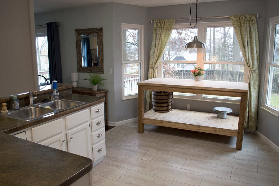 Large kitchen with plenty of counterspace overlooking the backyard.