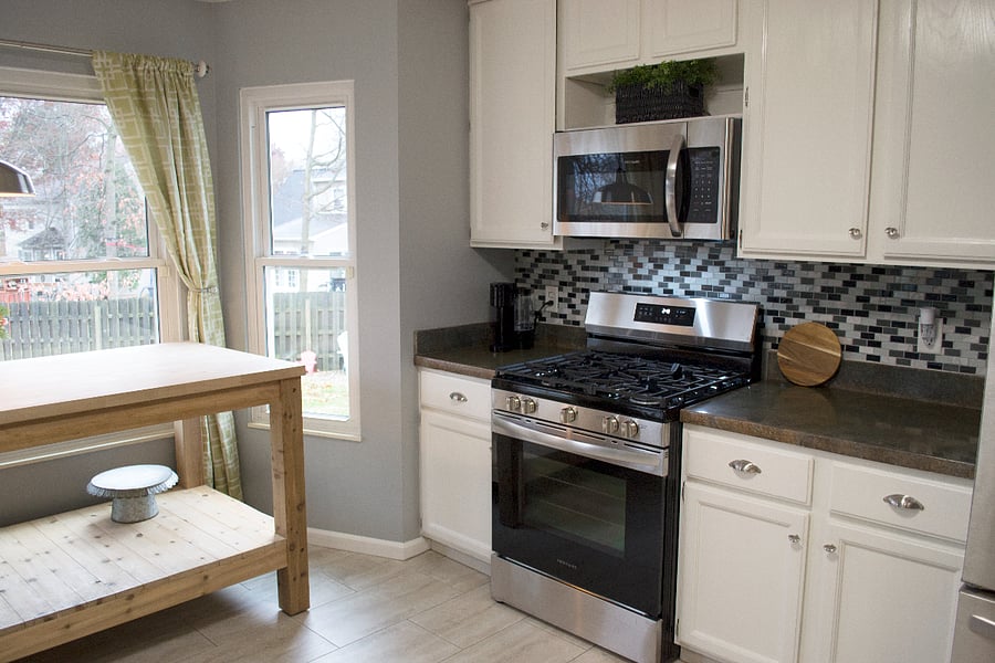 New appliances with a gas range. Plenty of cabinets for storage to hold kitchen items (included).