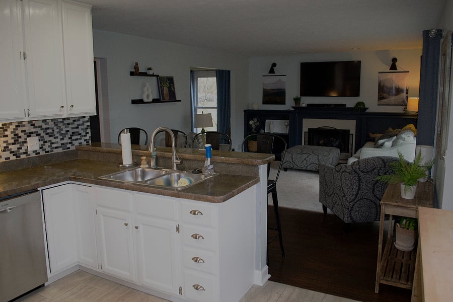 Kitchen overlooks the family room making it easy to be involved in conversations while cooking or cleaning up. The TV is also viewable from the kitchen.
