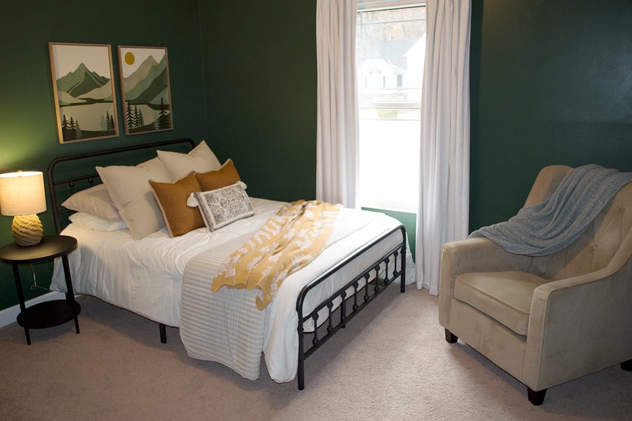 The third bedroom has a full size bed and a walk in closet.
