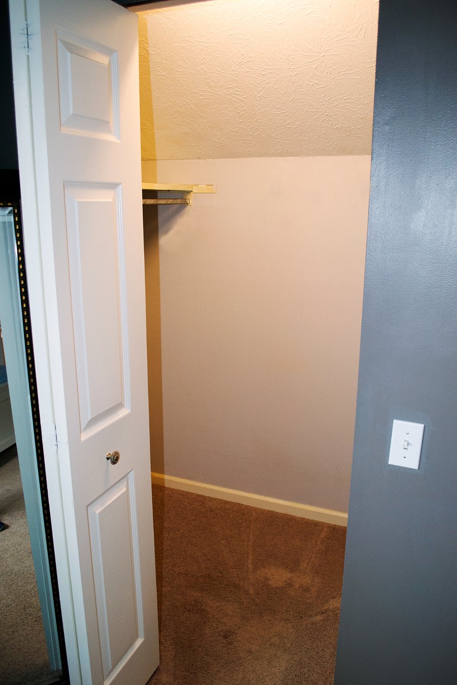 The second walk in closet is on the opposite side of the room and while smaller, still offers a considerable amount of room to hang clothes.