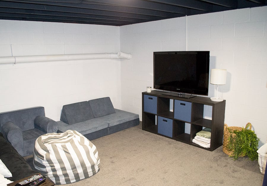 The basement is the perfect spot to watch a movie or do some exercising.