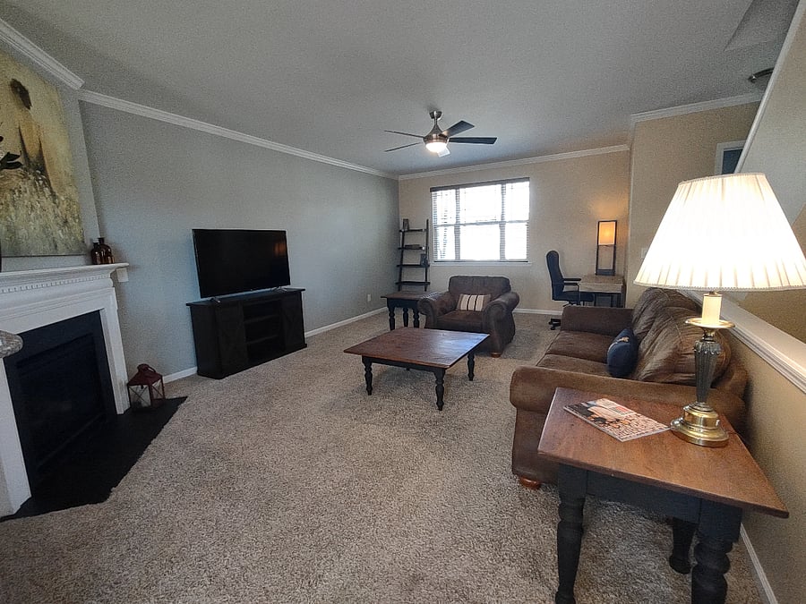 Main living space with comfortable seating and work space