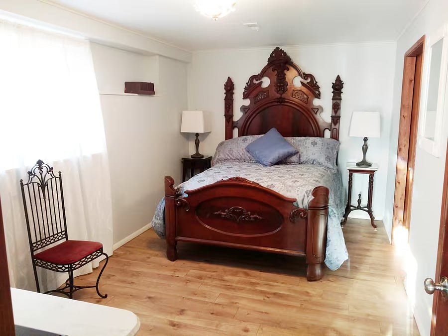 1800's antique bed (very comfortable). Bed-side lamps.