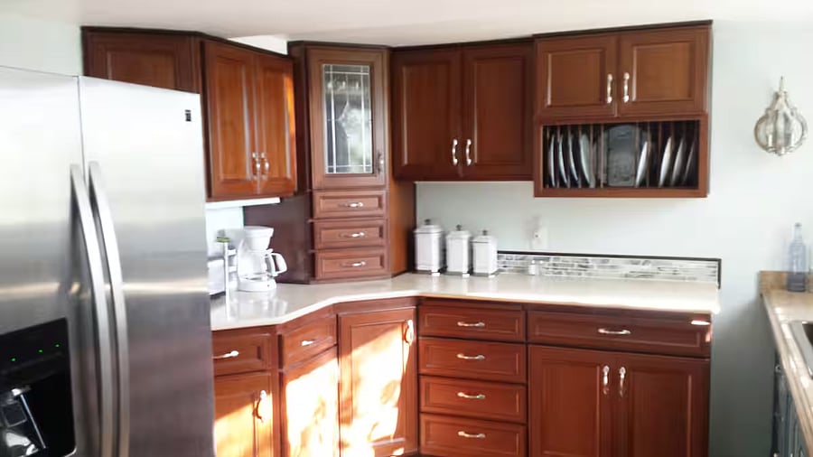 Left side of kitchen. Kitchen cupboards, coffee nook.