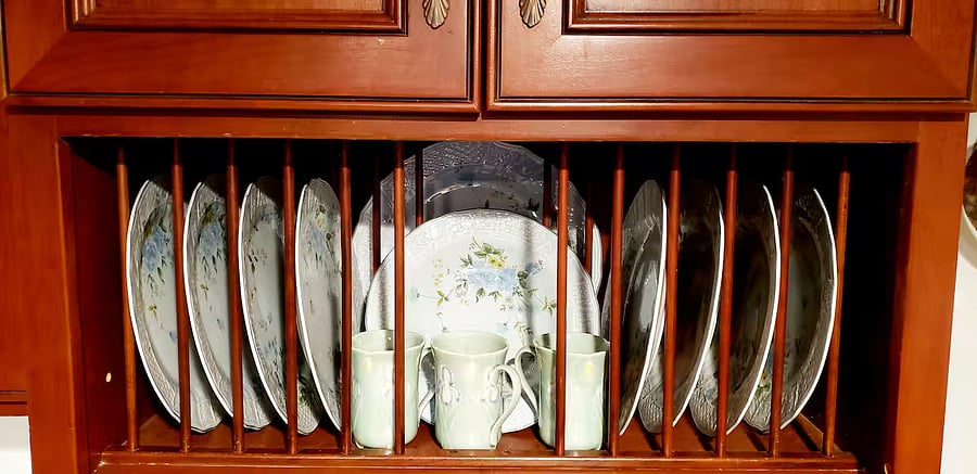 Dish rack with dishes.