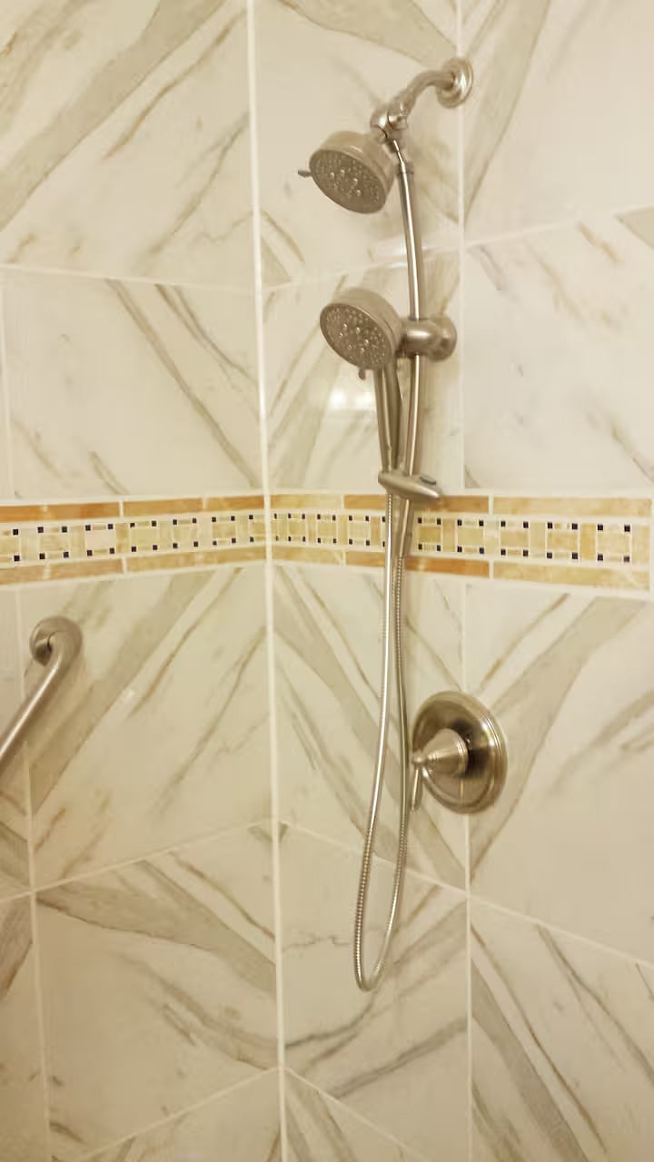 Inside the tiled shower.