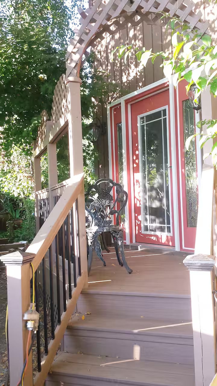 The door to your own deck with a small table and 2 chairs. Perfect for morning coffee or the watch the sunset.