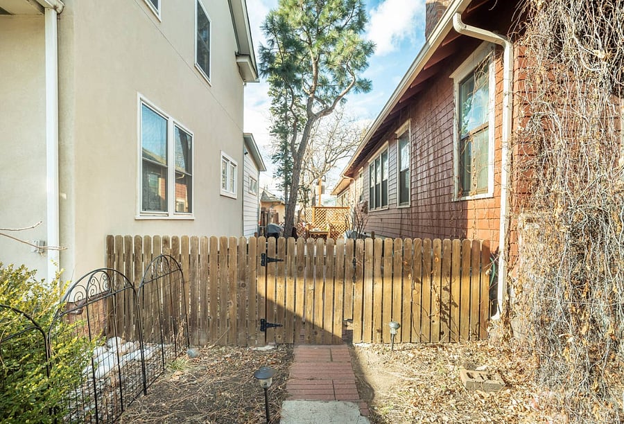 View of private side yard entrance from street