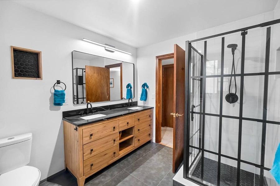2 sink bathroom with shower