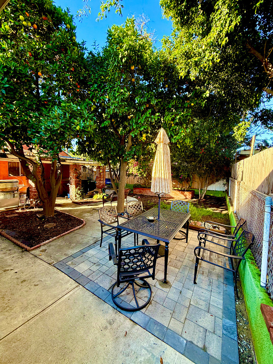 Spacious outdoor dining and relaxation area. A quiet, private retreat great for reading, sipping coffee, or decompressing after work.