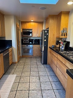 Kitchen:  Large and with all the amenities and cookware you could need