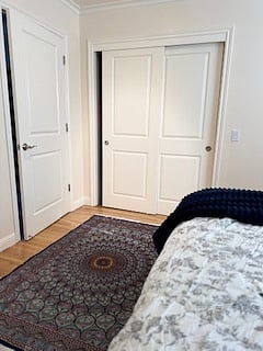 Bedroom 1 has a full sized closet with storage and serves as a dresser