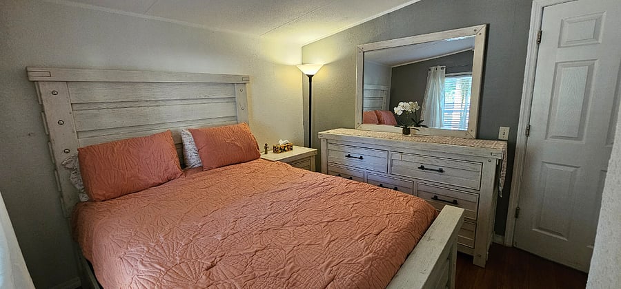 third bedroom queen bed with remote adjustable bed frame & 42 inch smart TVsecond