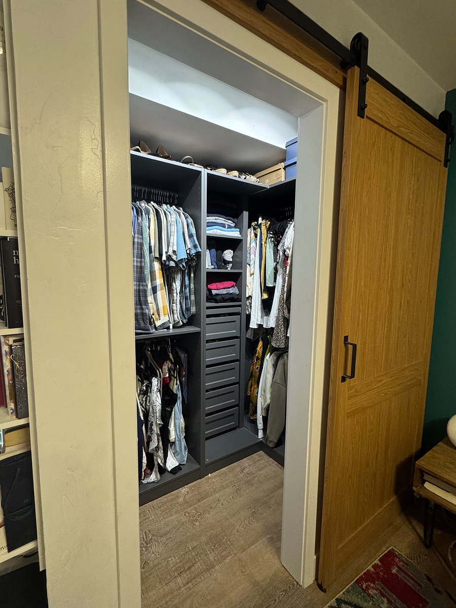 Primary bedroom walk-in closet