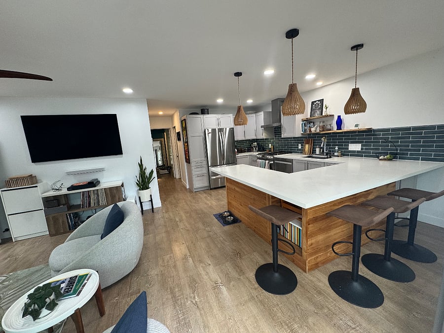Kitchen and counter dining area; hallway to bedrooms