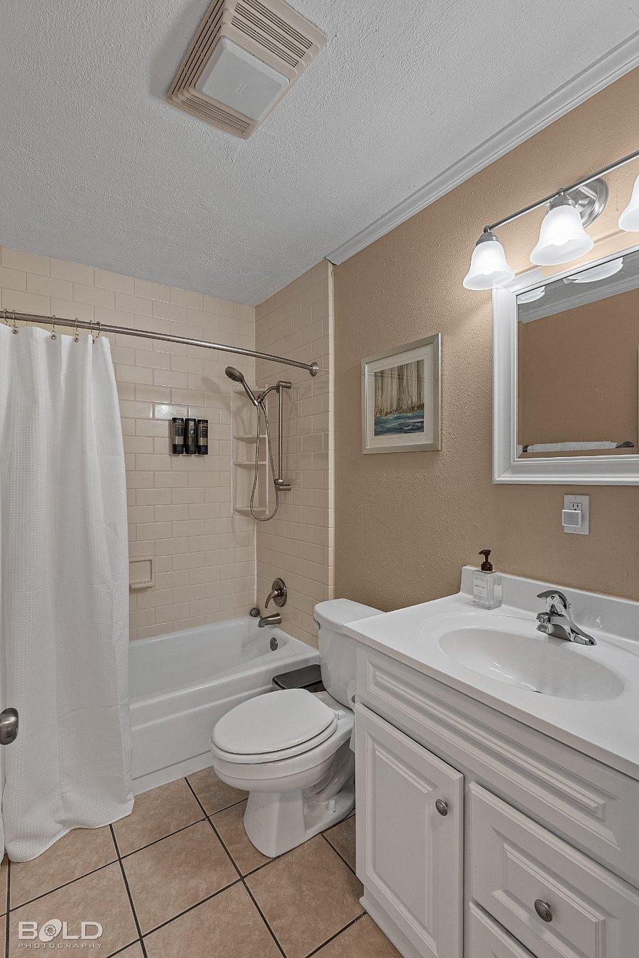 Full bath with supplies including Dove Body Wash, Terra Pure Hotel shampoo/conditioner and blow dryer