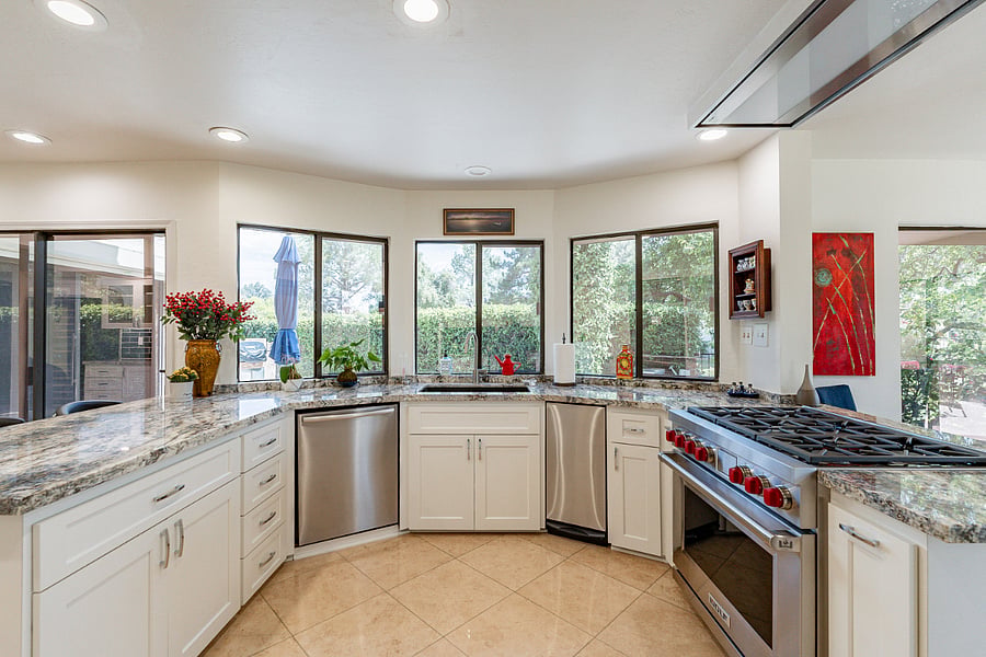Chef's kitchen overlooking pool