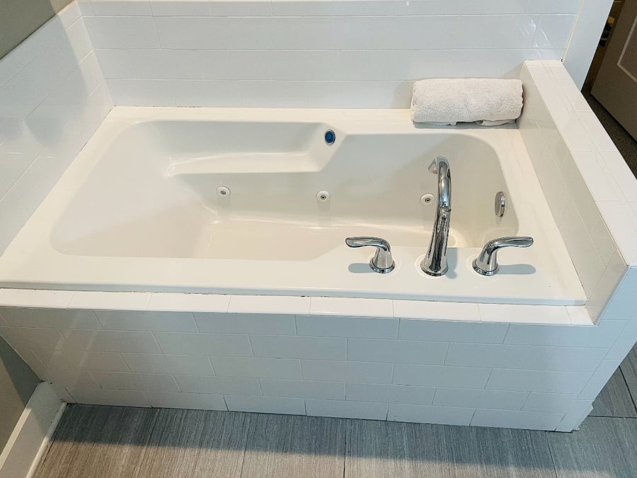 Bedroom 1 bathroom tub with jets