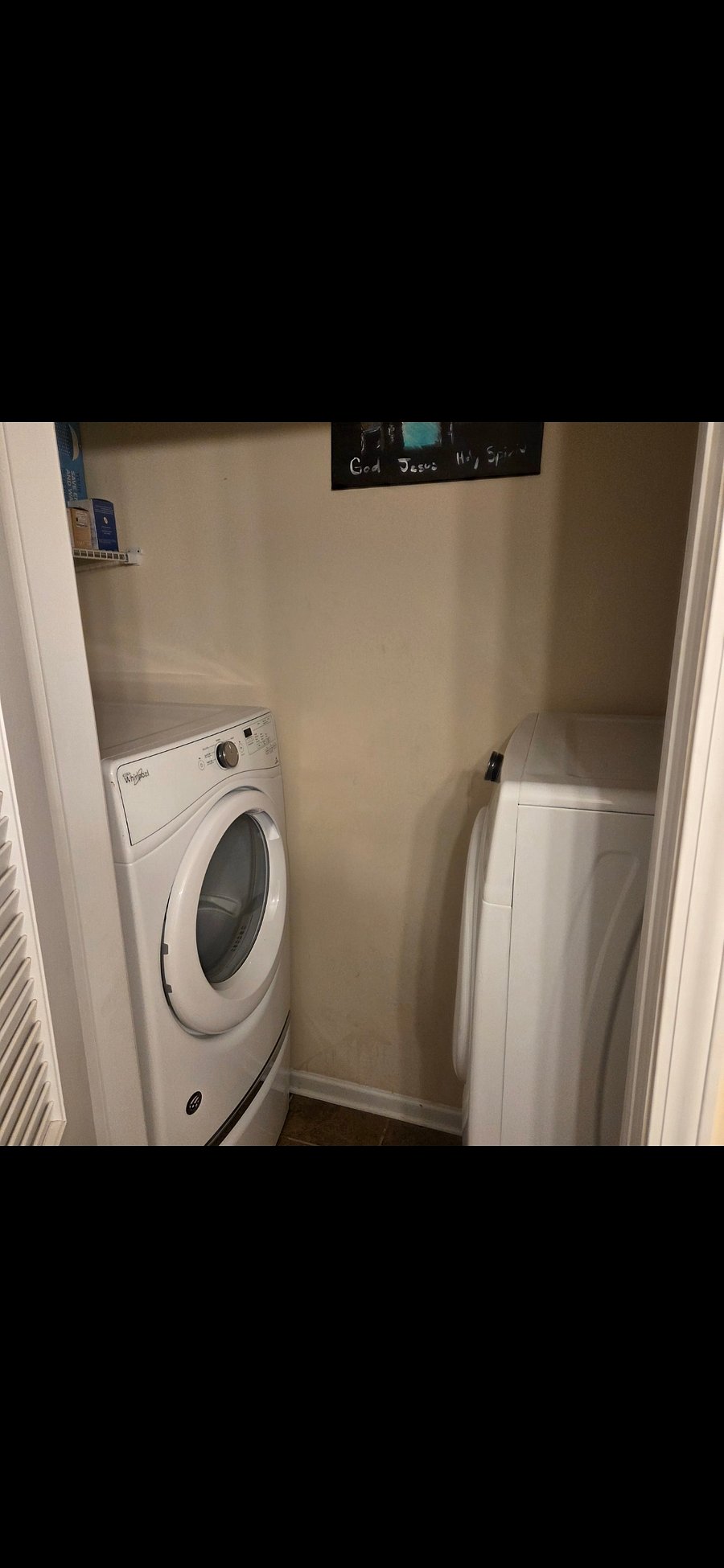 Laundry in primary bedroom in bathroom
