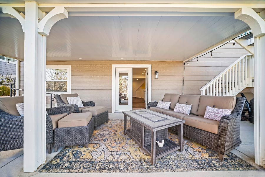 Private covered patio with cozy outdoor seating right outside your private entrance.