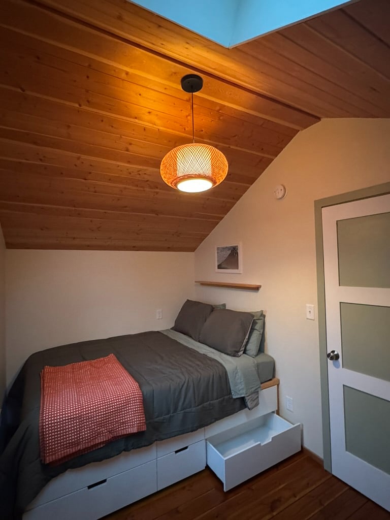 south bedroom with built in queen bed