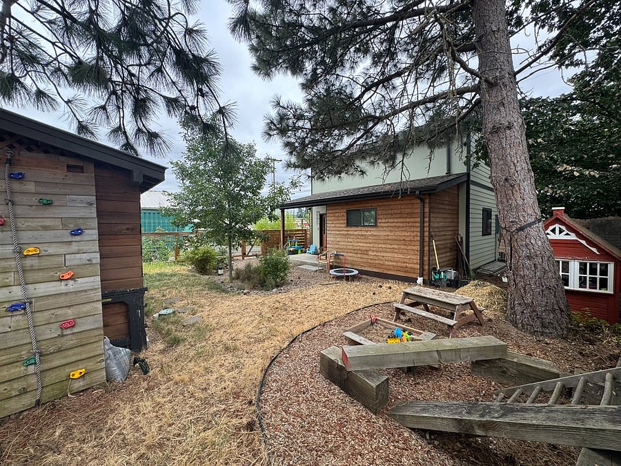 fenced yard shared with one other furnished finder house (left)