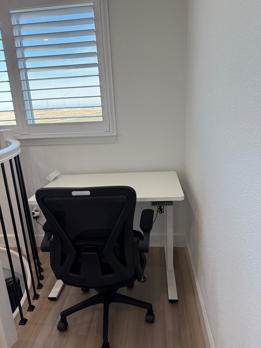 Dedicated workspace.  Desk is height adjustable