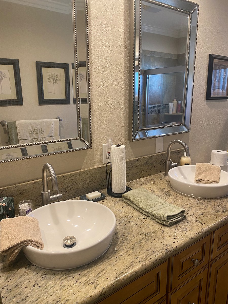 Bathroom has double sinks a bathtub and shower. Cleaning supplies are under sink. Yours only. You are responsible for very neat upkeep. Towels are included