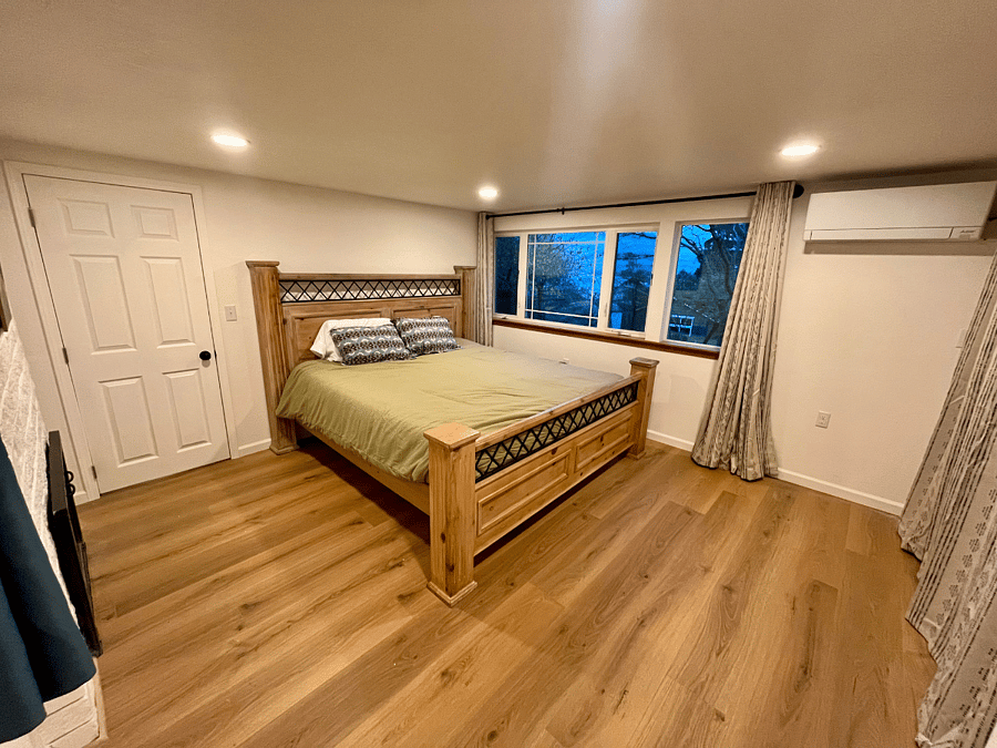 California King Bedroom from far corner (not shown: this room now has a wooden dresser under the mini split unit)