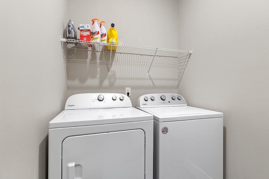 A dedicated in-unit laundry room with a full-size washer and dryermaking mid-term stays convenient and stress-free