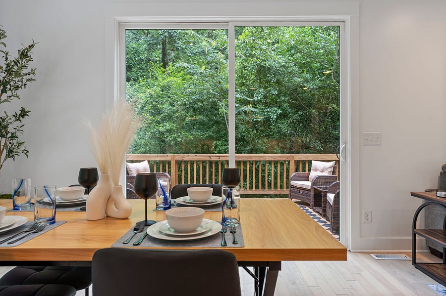 Kitchen/dining open to outdoor space.