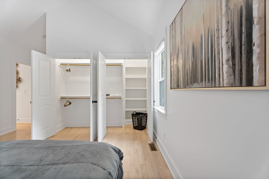 Primary bedroom custom closet. 
All bedroom closets have custom built o shelving.