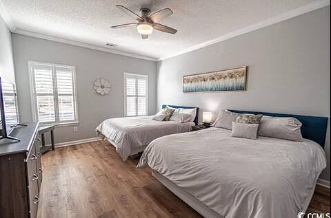 Bedroom #2, including 2 queen beds. Shared bathroom