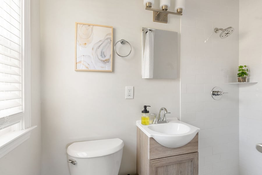 Full bathroom en-suite private to the primary bedroom - standing shower
