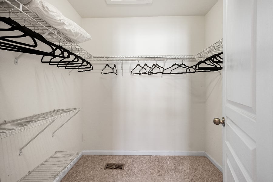 Primary room walk in closet
