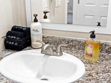 Soap, lotion, and makeup wash cloths available for guests in bathroom 