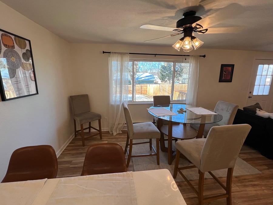 View from kitchen into dining room and sitting room. Open concept living!