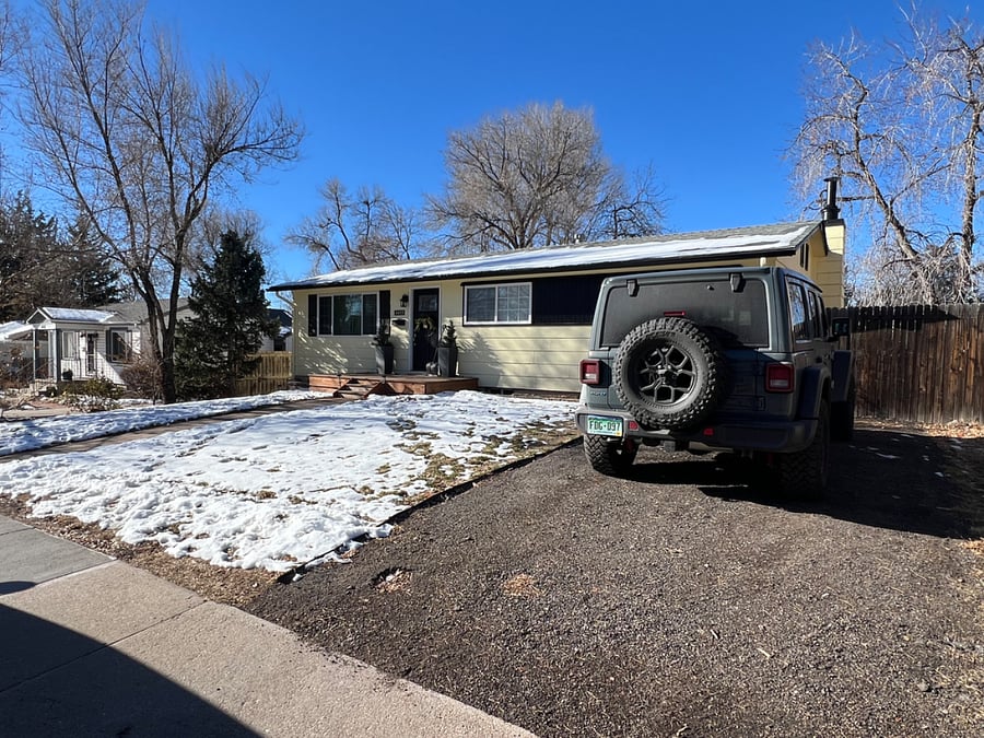 Front yard and driveway parking spot