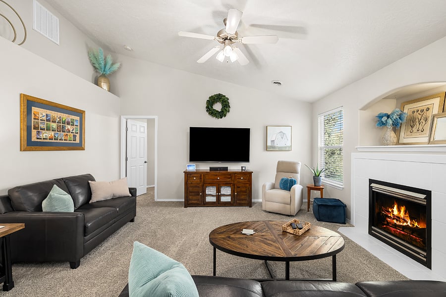 65 Smart Roku TV in living room with golf course views.