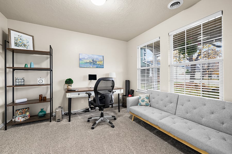 Dedicated office/flex space. Yoga mat, foam roller, and a few hand weights provided. Also a great space for kids to play games, or a quiet spot to get away. Lightweight futon can open to sleep a child.