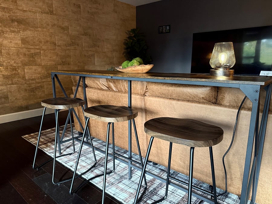 Eating bar with power outlet on top.